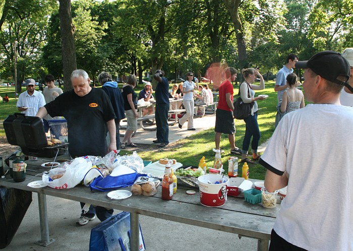 July 2009: The picnic in full swing--George doing a great job with the BBQ. - Newlife Church Picnic