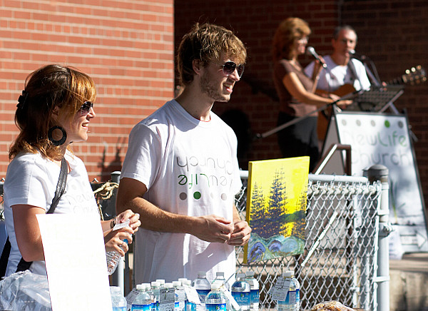 Luke and Amanda, manning the table - Newlife Church Toronto at the Cabbagetown Festival