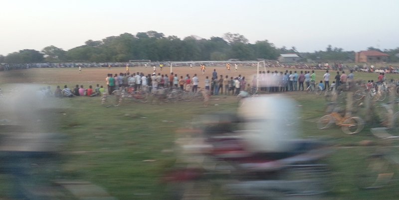 Soccer match, probably between two rival towns